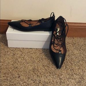 Black lace up flats